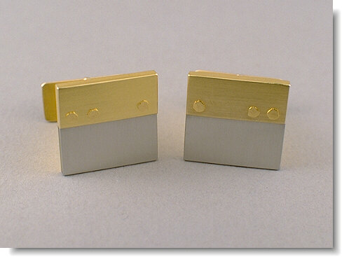 18K gold and stainless steel cufflinks